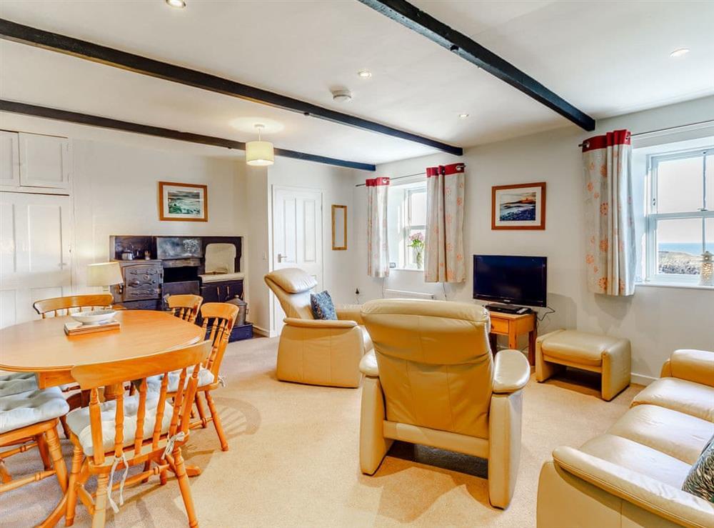 Living room/dining room at Dovecote Cottage in Embleton, Northumberland