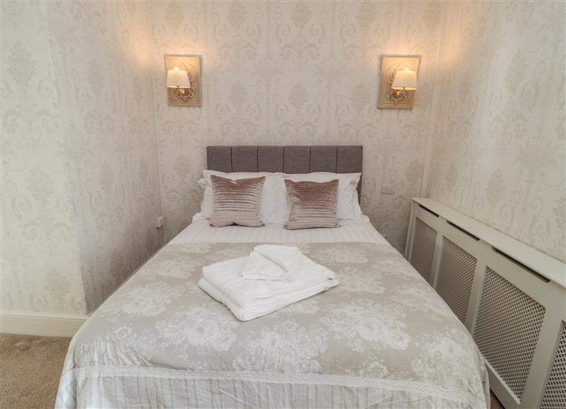 A bedroom in Dovecote Cottage at Dovecote Cottage, Otterburn