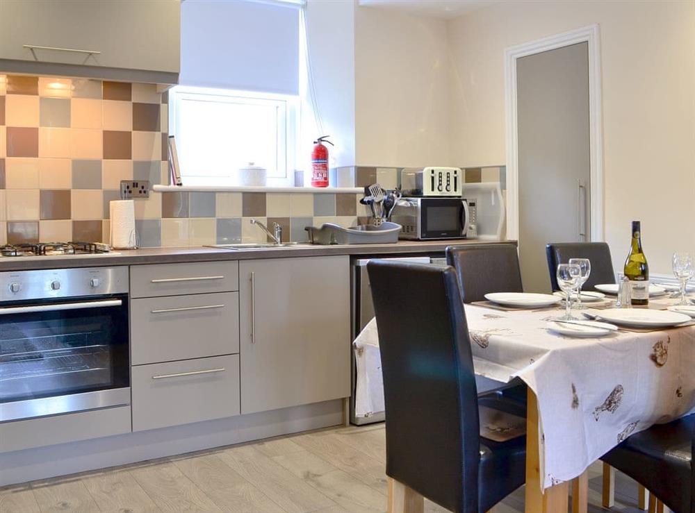 Well equipped kitchen/ dining area at Dovecote House in Wooler, Northumberland