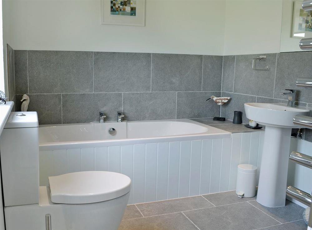 Modern style bathroom with shower cubicle at Dover Row Cottage in Zelah, near Perranporth, Cornwall