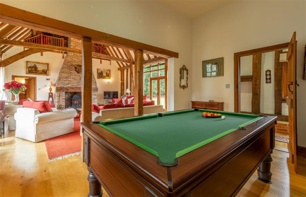 Games area with pool table and giant Connect 4 at Doves Barn, Needham Market
