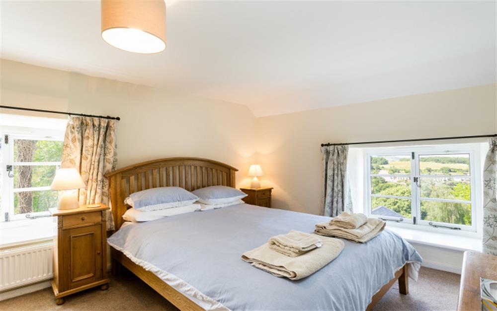 The spacious master bedroom which enjoys fabulous views. at Dower House in Dittisham