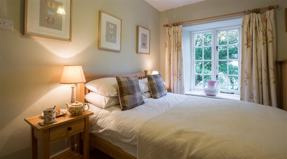 The double bedroom at Downhouse Farm Cottage in Bridport, Dorset