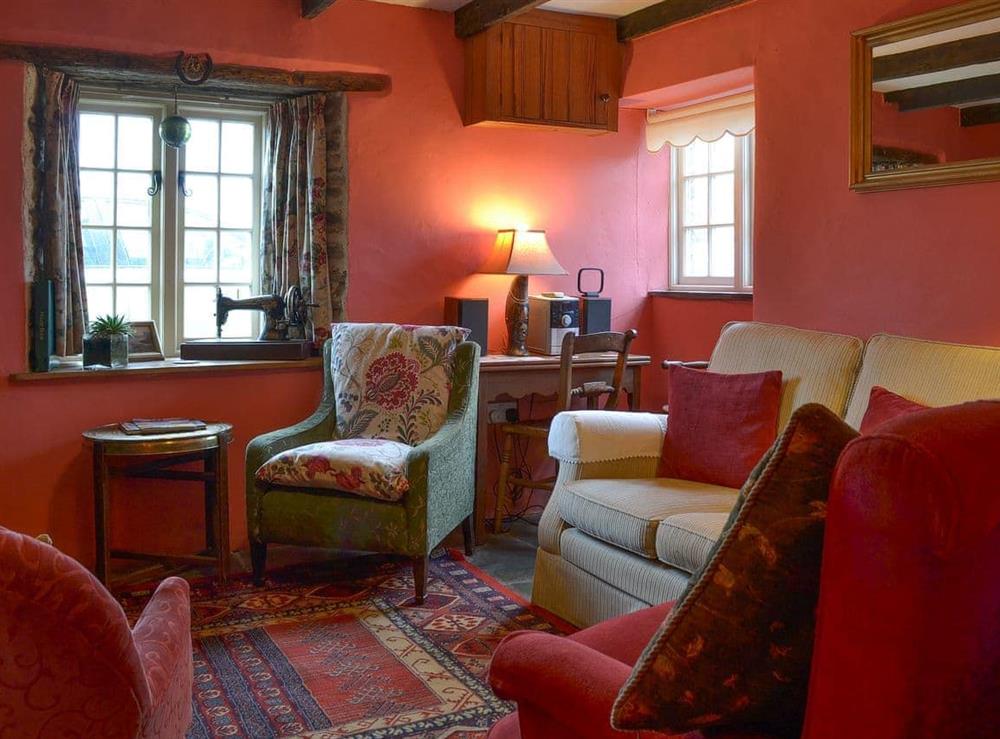 Delightful beamed living room at Downhouse in Trebarwith, Delabole, Cornwall., Great Britain