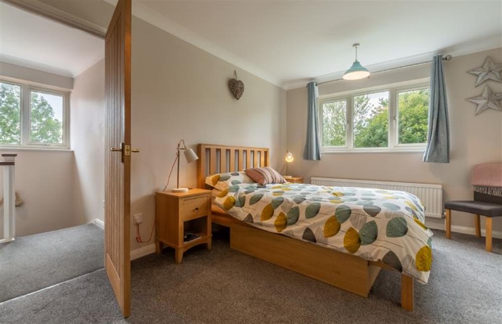 First floor: Master bedroom at Downlands, Burnham Market  near Kings Lynn