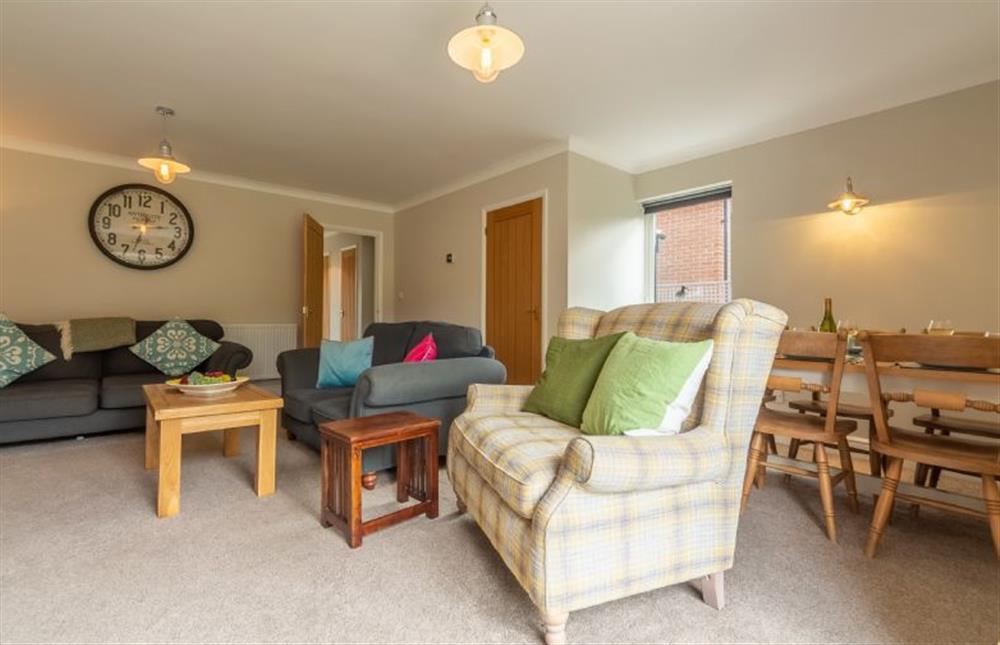 Ground floor: Sitting room with dining area at Downlands, Burnham Market  near Kings Lynn