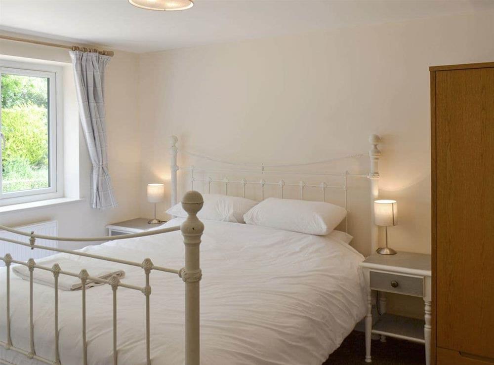 Relaxing ground floor double bedroom at Louisas Cottage, 