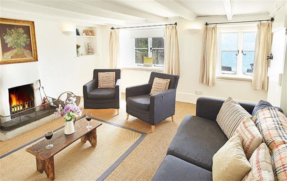 Ground floor:  Sitting room with open fire at Downsteps Beach House, Torcross