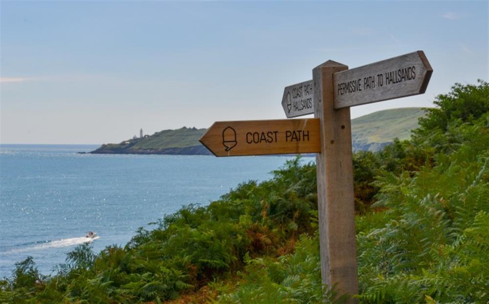 The South West Coast Path passes right past the cottage. at Downsteps Beach House in Torcross