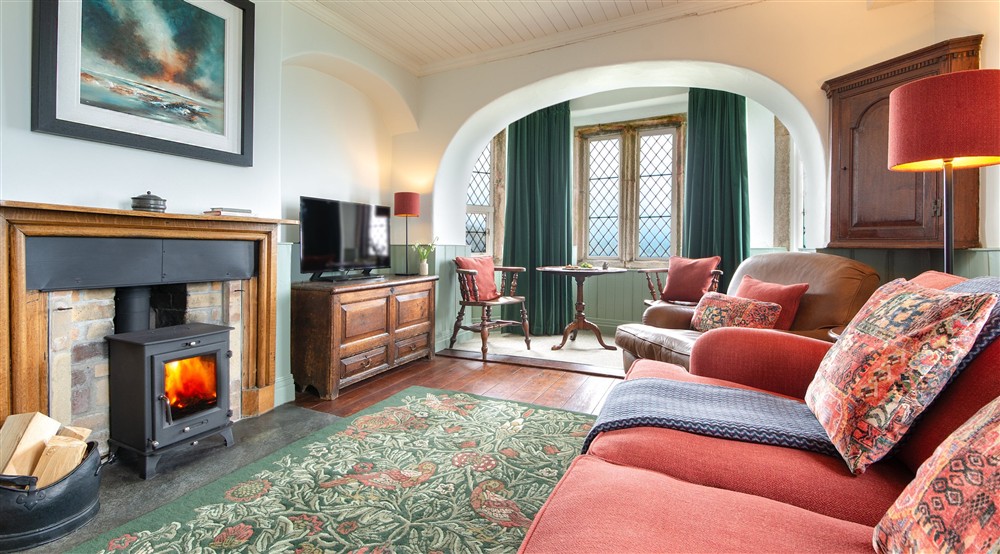 The sitting room at Doyden Castle in Port Quin, Cornwall