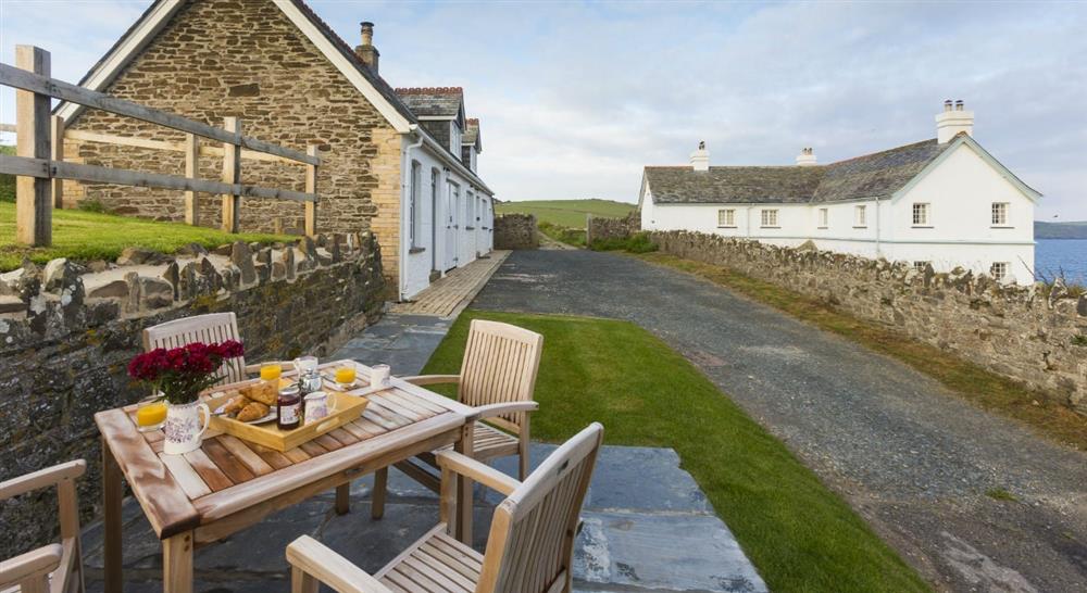 The exterior, garden and view of Doyden House at Doyden Stable Cottage in Port Quin, Cornwall