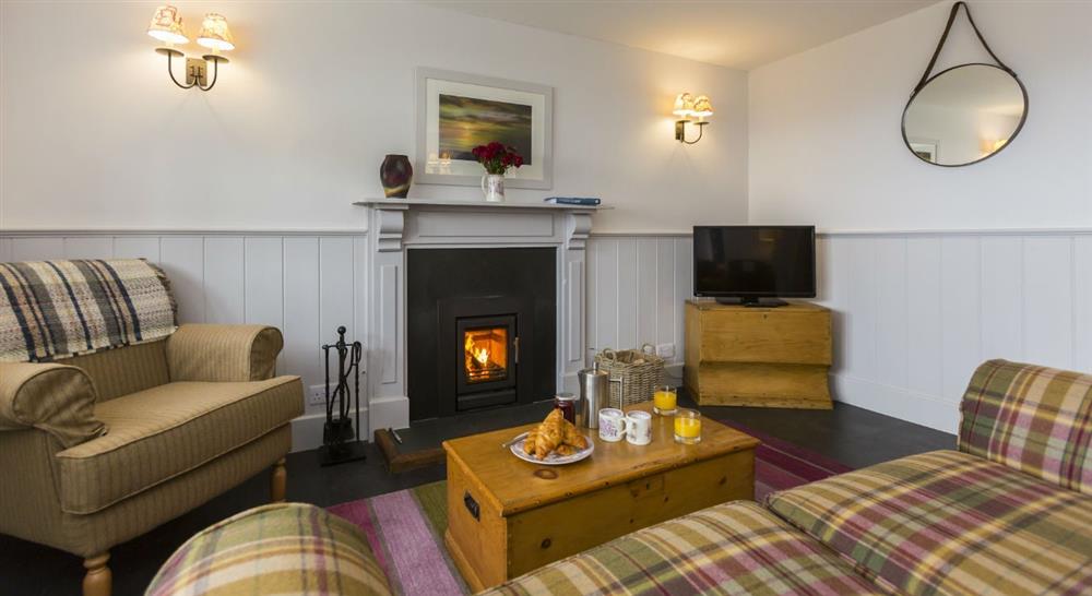 The sitting room at Doyden Stable Cottage in Port Quin, Cornwall