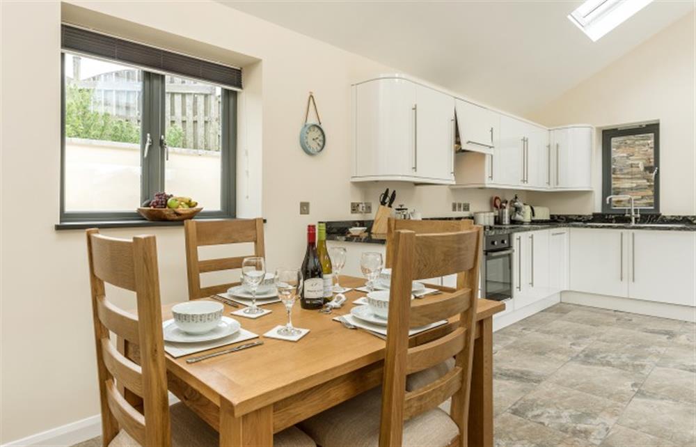 The dining room off the kitchen at Dragon Barn, Tintagel
