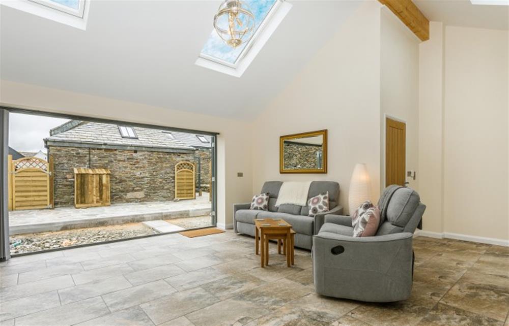 The spacious and bright living/kitchen/dining room at Dragon Barn, Tintagel