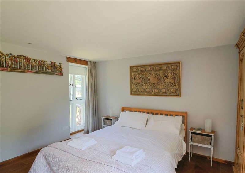 A bedroom in Dragon Cottage at Dragon Cottage, Musbury