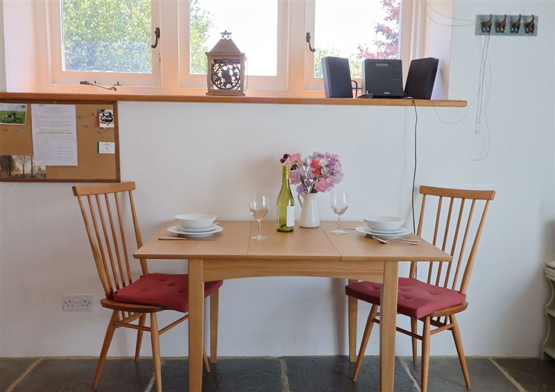 The dining area at Dragon Cottage, Musbury