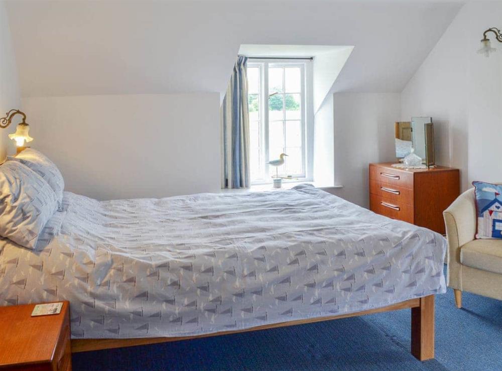 Comfortable and romantic double bedroom at Dragonfly Cottage in Brompton by Sawdon, North Yorkshire