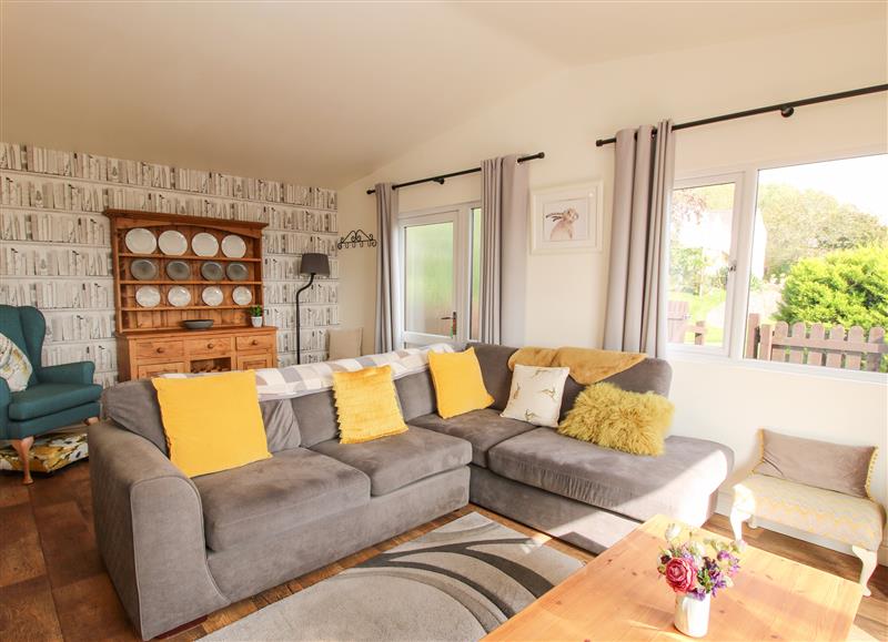 Relax in the living area at Dragonfly Lodge, Worthen near Minsterley