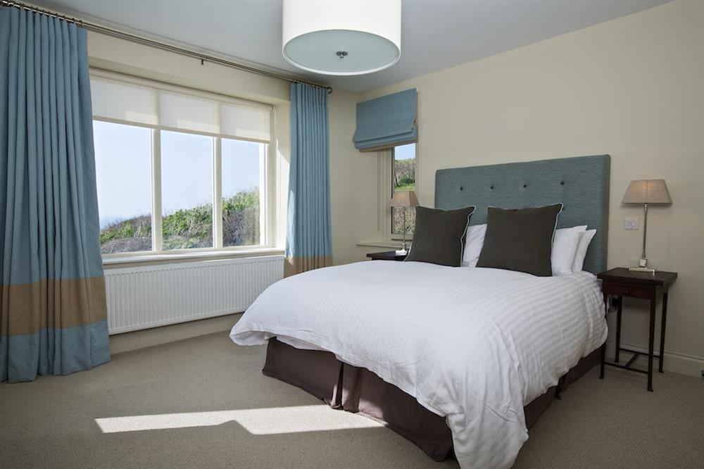 En suite double bedroom with sea views at Drake House in , Hope Cove
