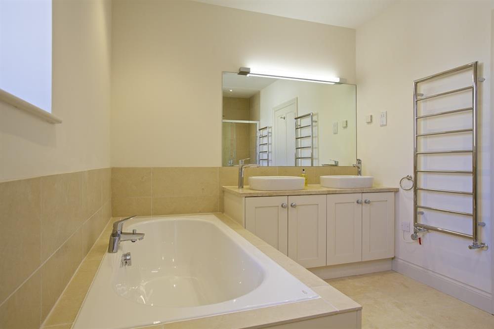 Stunning family bathroom with bath and walk-in shower at Drake House in , Hope Cove