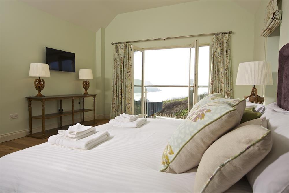 Sumptuous master suite with super-King size bed and sea views at Drake House in , Hope Cove