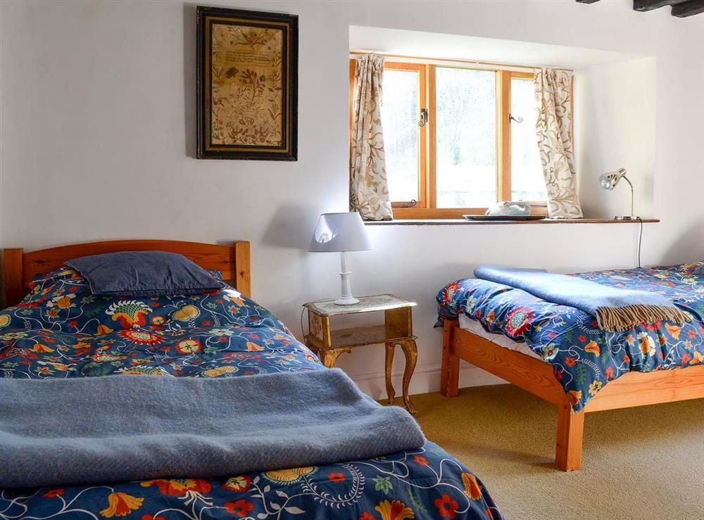 Twin bedroom at Driftcombe Farmhouse in Bisley, Glos., Gloucestershire