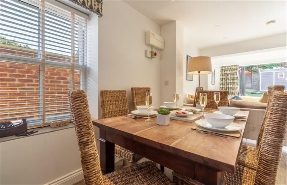 Dining table with seating for six at Driftwood Cottage, Brancaster near Kings Lynn