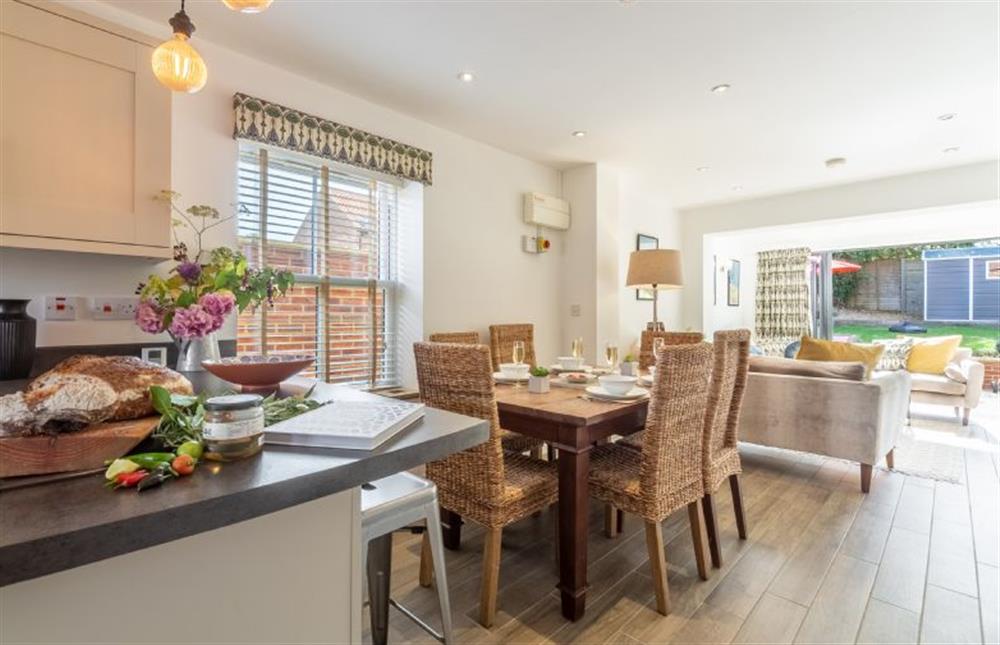 Open plan kitchen, dining area and sitting room at Driftwood Cottage, Brancaster near Kings Lynn