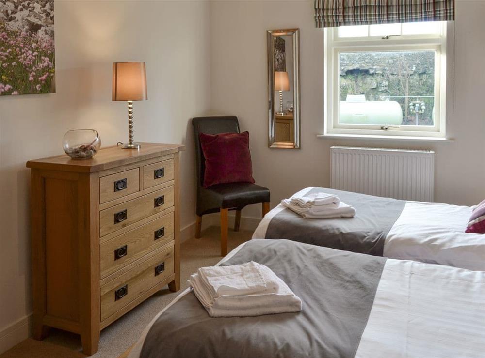 Good-sized twin bedroom at Driftwood Cottage in Newton-by-the-Sea, near Alnwick, Northumberland