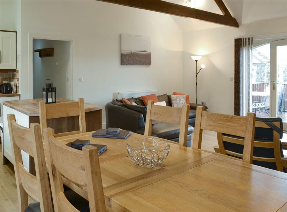 Light and airy dining space at Driftwood Cottage in Newton-by-the-Sea, near Alnwick, Northumberland