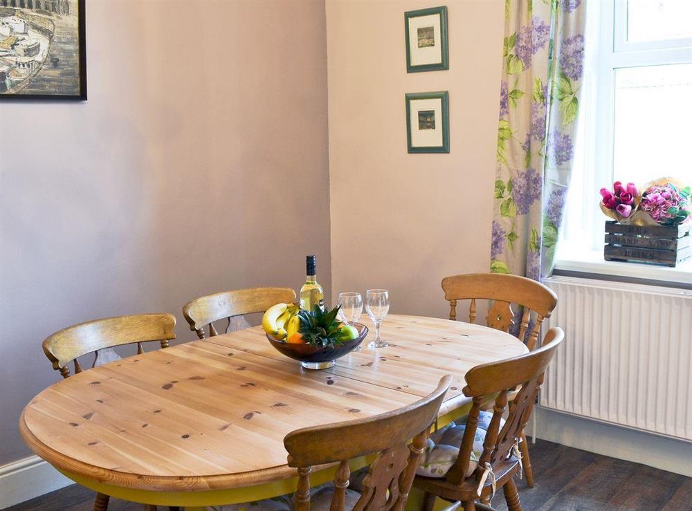 Dining area at Driftwood Cottage in Seahouses, Northumberland