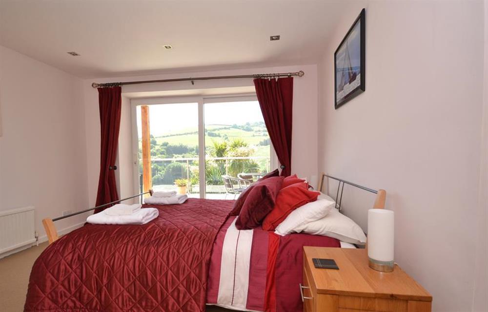 Another view of the master bedroom with en suite at Driftwood, Dartmouth