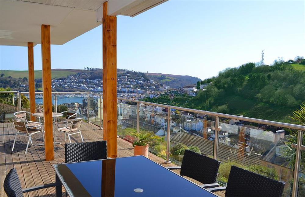 The decked terrace running the width of the house outside the bedrooms at Driftwood, Dartmouth
