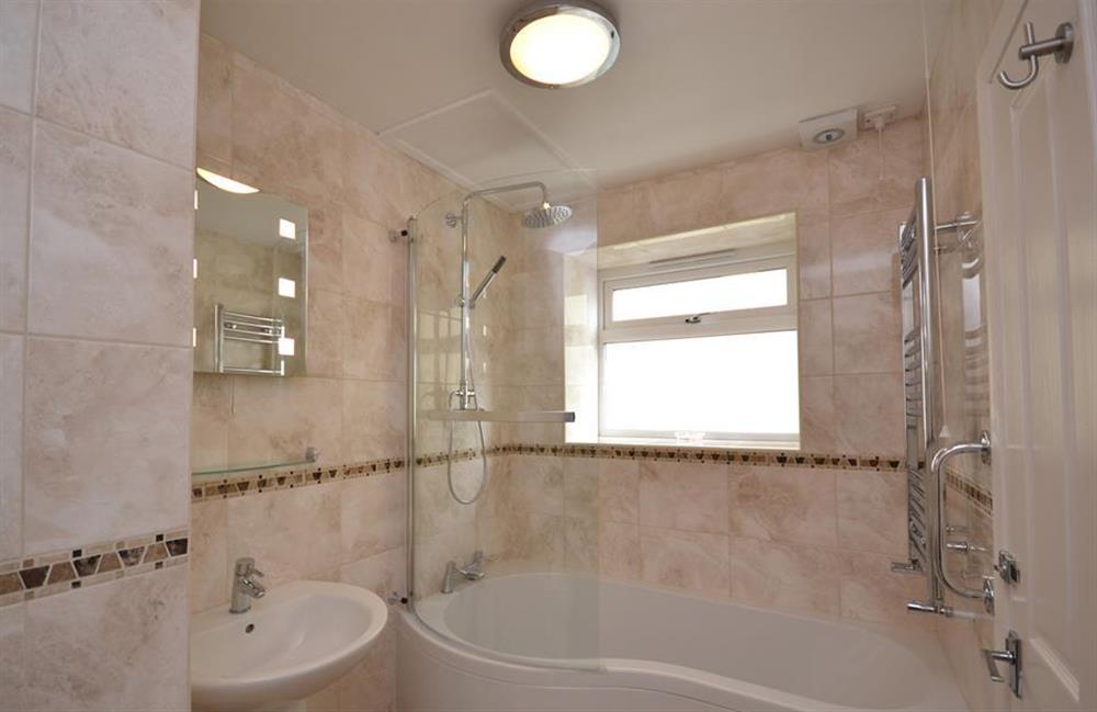 The modern family bathroom at Driftwood, Dartmouth
