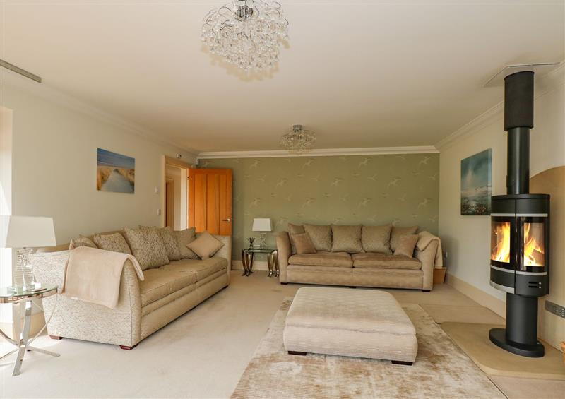 Relax in the living area at Driftwood House, Ringstead