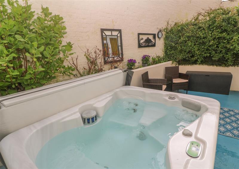 Relax in the hot tub at Driftwood, Marazion