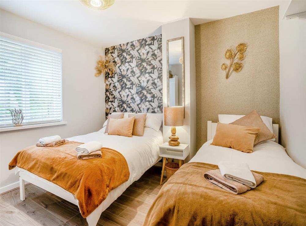 Twin bedroom at Driftwood in Mumbles, West Glamorgan