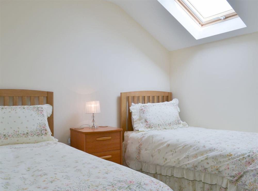 Lovely bedroom with twin single beds at Driftwood in Port Isaac, Cornwall