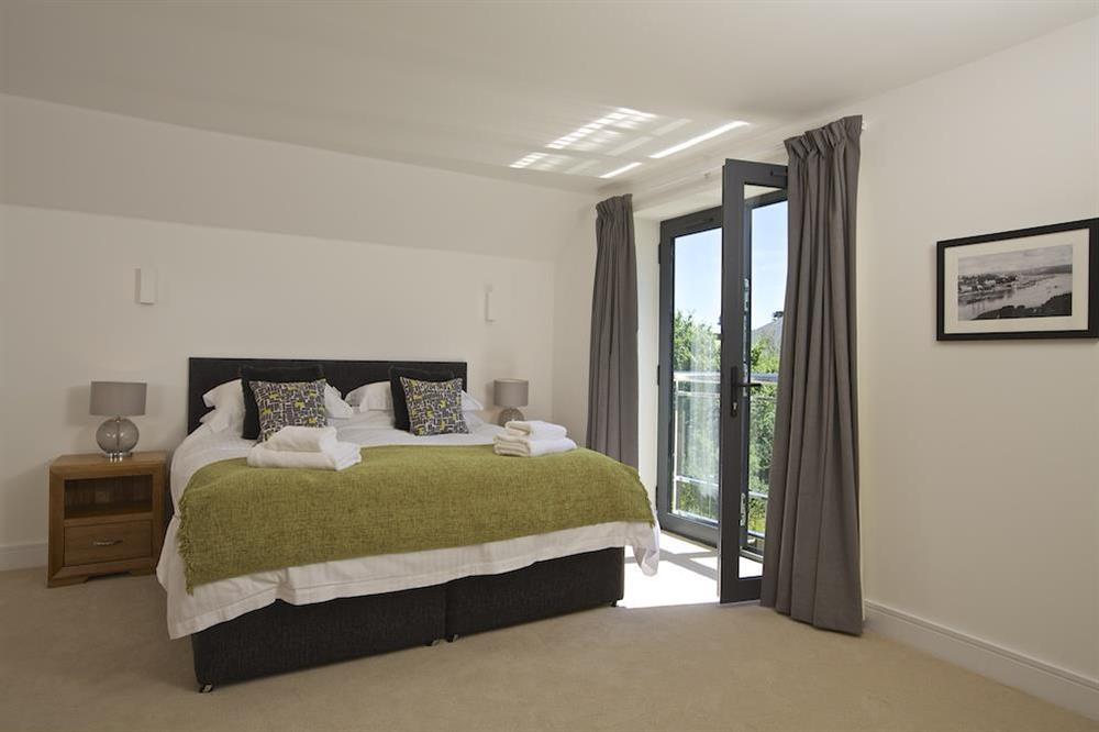First floor master suite with super-King size bed and Juliet balcony at Driftwood in , Salcombe