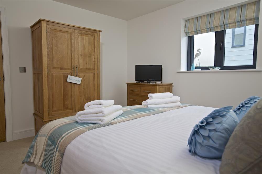 Ground floor bedroom with en suite shower room at Driftwood in , Salcombe
