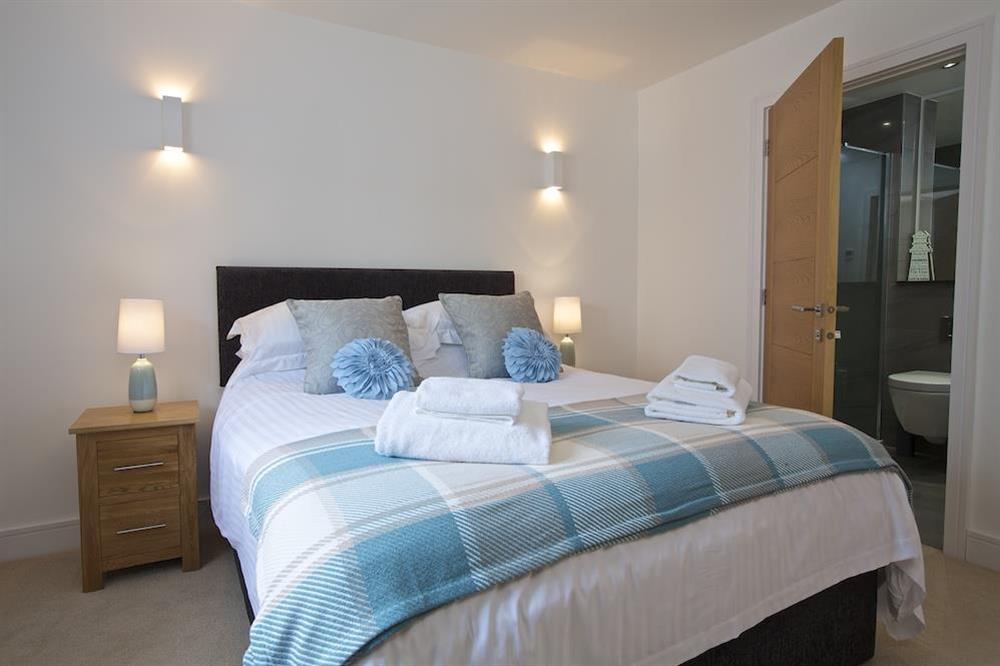Ground floor bedroom with King size bed and en suite shower room (photo 2) at Driftwood in , Salcombe