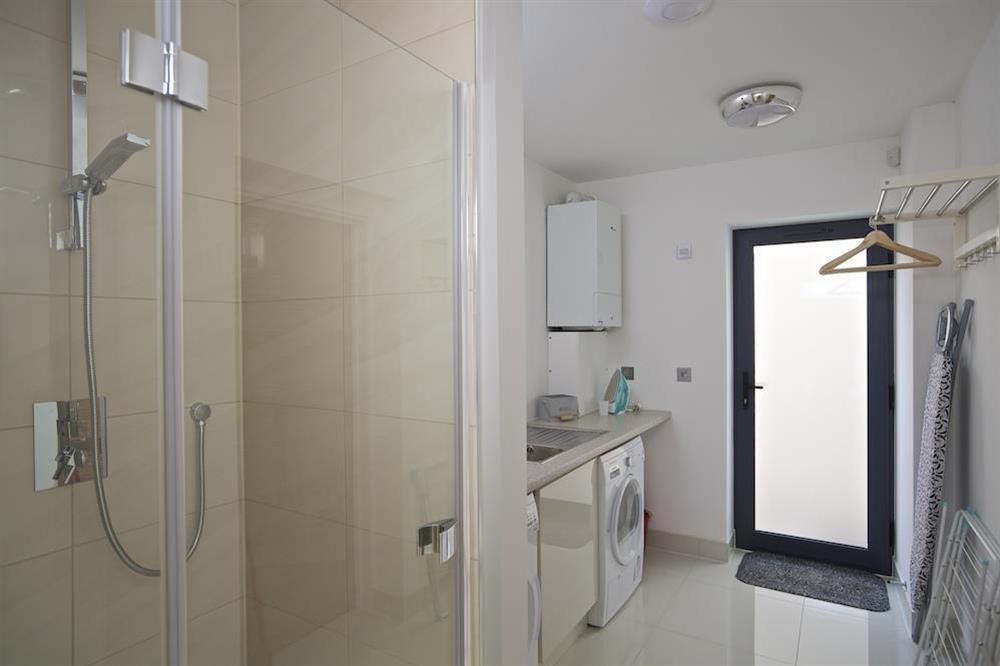 Ground floor utility room with shower facilities at Driftwood in , Salcombe