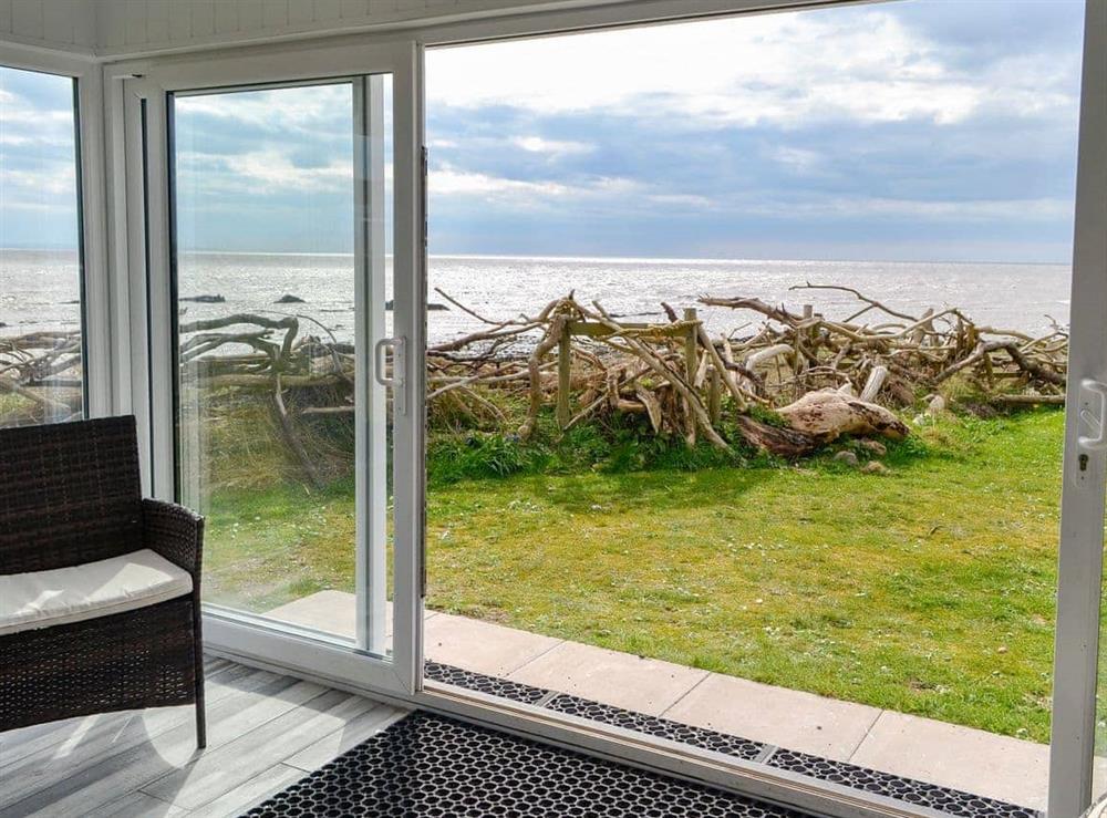 Seaside views from the conservatory at Driftwood in Southerness, Dumfries, Dumfriesshire