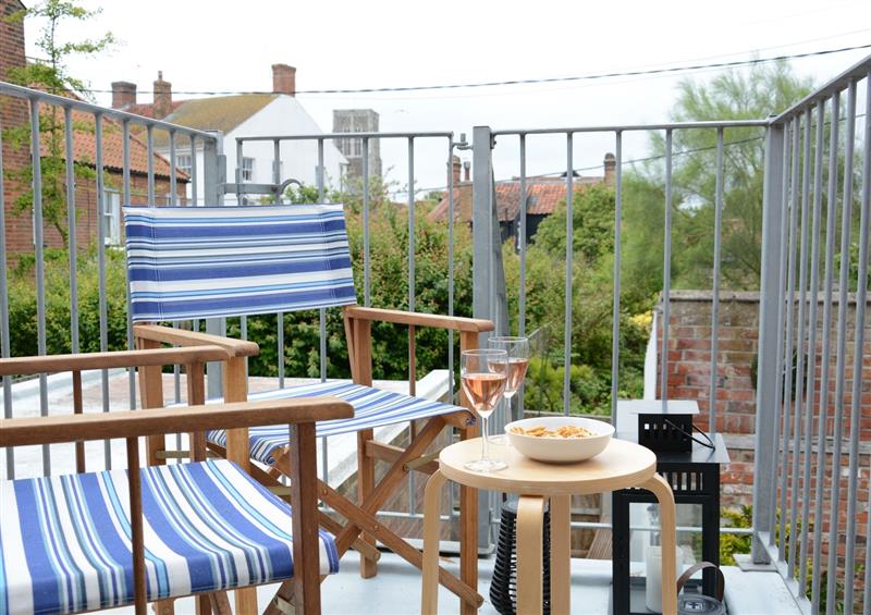 Enjoy a cup of tea on the patio at Driftwood, Southwold, Southwold