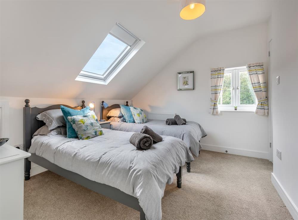 Twin bedroom at Driftwood in Teignmouth, Devon