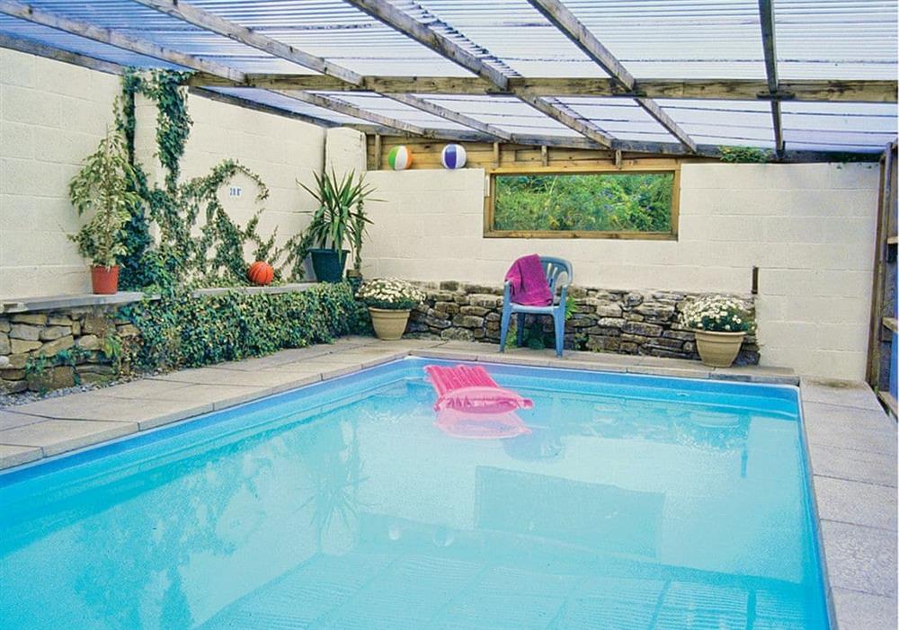 Drum and Monkey Cottage covered heated swimming pool at Drum And Monkey Cottage in High Peak, Derbyshire
