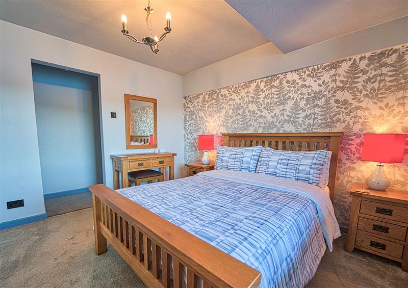 This is the bedroom at Drysgol Lakeside Apartment, Bala