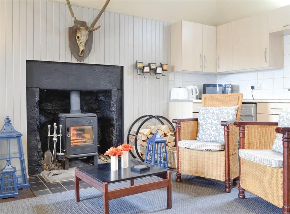 Open plan living space at Duck Bay Cottage 1 in Alexandria, Dumbartonshire