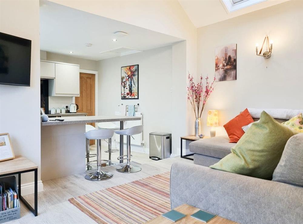 Open plan living space at Duck Cottage in Tholthorpe, North Yorkshire