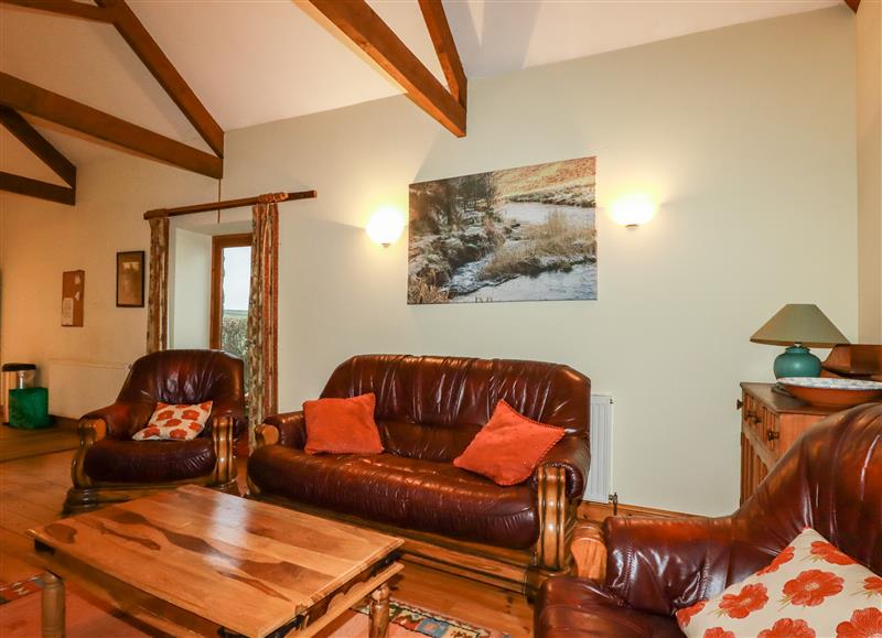 Relax in the living area at Duck House, Hersham near Stratton